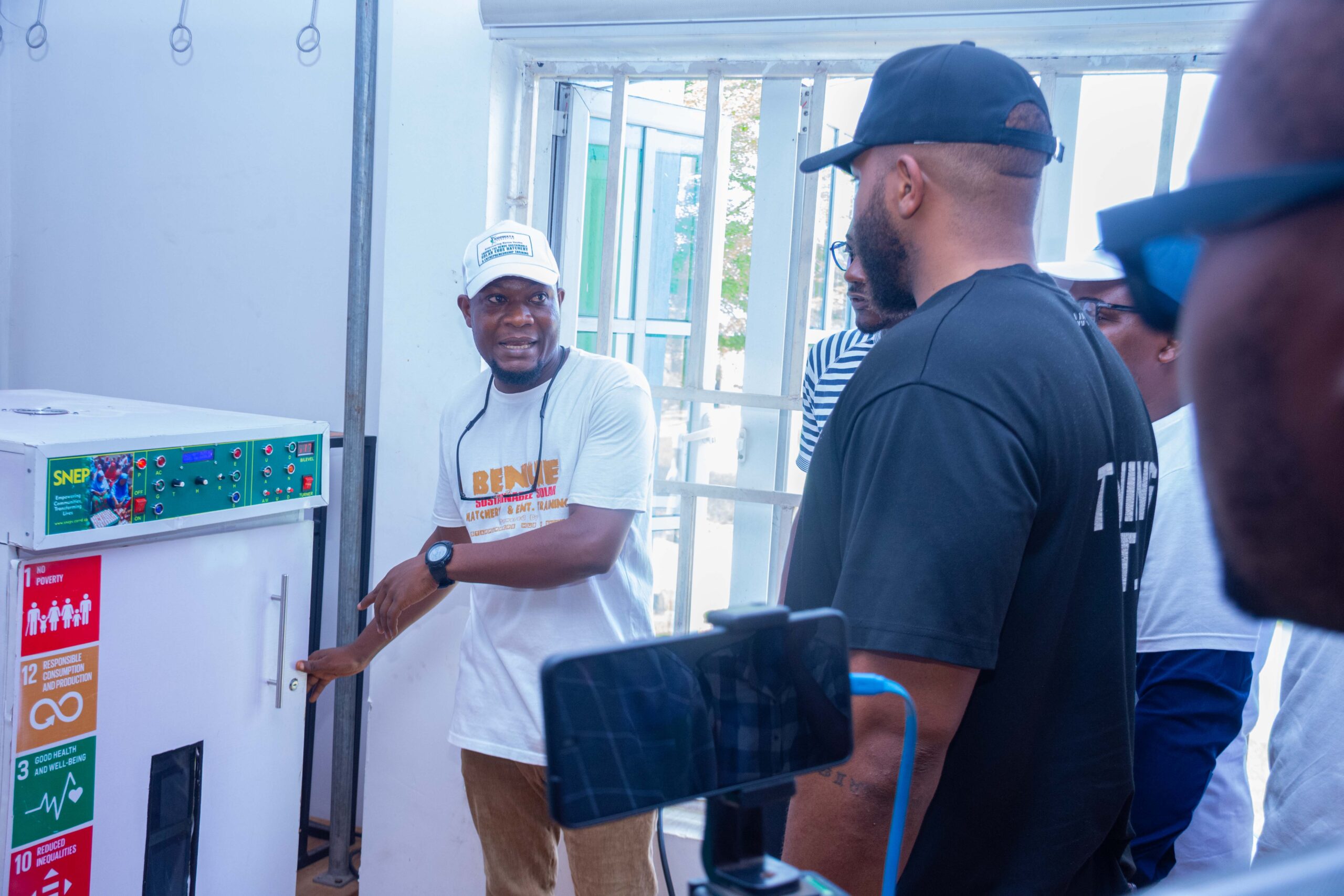 The management team of the Kiddwaya Foundation visiting the youth training facility